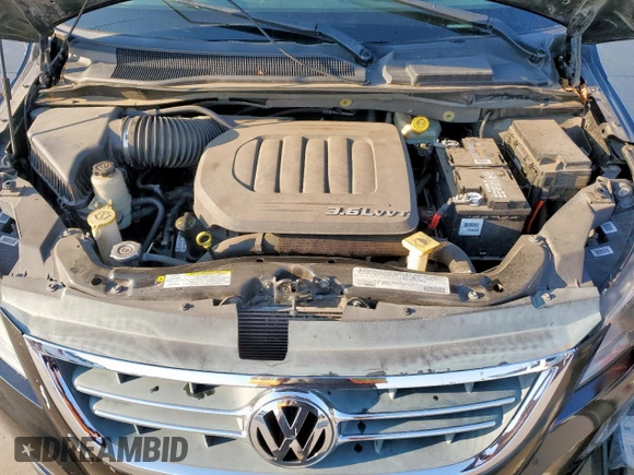 2012 Volkswagen Routan SE with VIN 2C4RVABG9CR293738, listed as a Copart auction lot 56408455 with 123,546 mi miles and Clean title. Bid and sale history available at DreamBid. Image 12.