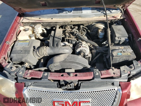 2006 GMC Envoy Denali with VIN 1GKES63M762237958, listed as a Copart auction lot 76999574 with 180,294 mi miles and Clean Title. Bid and sale history available at carsss.com. Image 12.