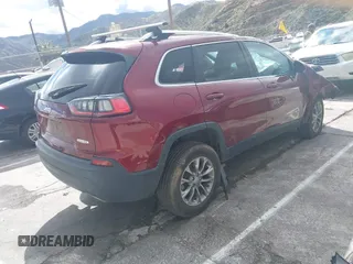 2019 Jeep Cherokee Latitude Plus with VIN 1C4PJMLX8KD330606, listed as a IAAI auction lot 41733246 with 94,408 mi miles. Bid and sale history available at carsss.com. Image 4.