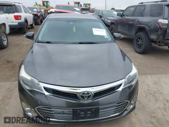 2015 Toyota Avalon Limited with VIN 4T1BK1EB4FU167011, listed as a IAAI auction lot 41582722 with 77,314 mi miles and . Bid and sale history available at DreamBid. Image 12.