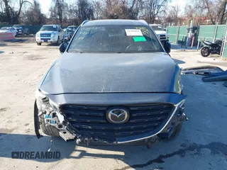 2021 Mazda CX-9 Grand Touring with VIN JM3TCBDY2M0530533, listed as a IAAI auction lot 41309425 with 84,747 mi miles. Bid and sale history available at carsss.com. Image 13.