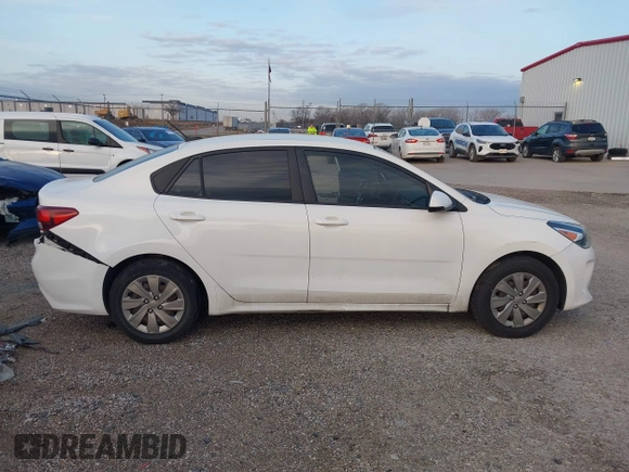 2019 Kia Rio S with VIN 3KPA24ABXKE215756, listed as a IAAI auction lot 41556461 with 122,300 mi miles. Bid and sale history available at carsss.com. Image 13.