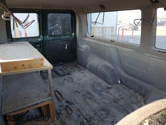 1999 Ford Econoline Passenger XL with VIN 1FMRE1126XHB41841, listed as a Copart auction lot 51338135 with 161,416 mi miles and Clean title. Bid and sale history available at DreamBid. Image 11.