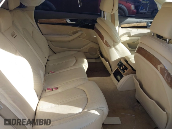 2012 Audi A8 z VIN WAURVAFD3CN024063, wystawiony jako IAAI lot #41706508 z przebiegiem Nie podano mil oraz . Historia ofert i sprzedaży dostępna na DreamBid. Obrazek 8.