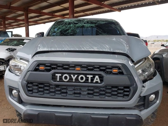 2019 Toyota Tacoma 4WD SR with VIN 3TMCZ5ANXKM225066, listed as a IAAI auction lot 41825265 with 75,908 mi miles. Bid and sale history available at carsss.com. Image 6.