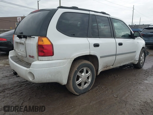 2008 GMC Envoy SLE2 with VIN 1GKDT13S582112468, listed as a IAAI auction lot 41686605 with 215,163 mi miles. Bid and sale history available at carsss.com. Image 4.