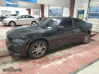 2015 Dodge Charger SXT with VIN 2C3CDXJG6FH884363, listed as a Copart auction lot 83520244 with 101,635 mi miles and Salvage Title. Bid and sale history available at carsss.com. Image 1.