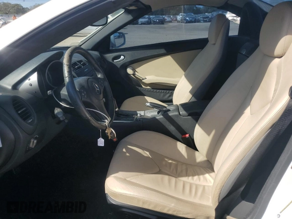 2009 Mercedes-Benz SLK-Class 3.0L with VIN WDBWK54F79F209339, listed as a Copart auction lot 77400294 with 68,540 mi miles and Salvage Title. Bid and sale history available at carsss.com. Image 7.
