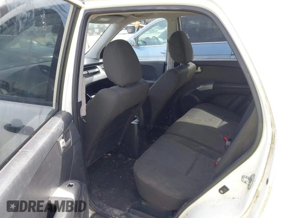 2009 Kia Sportage LX with VIN KNDJE723597560168, listed as a IAAI auction lot 41824779 with 110,386 mi miles. Bid and sale history available at carsss.com. Image 8.