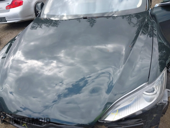 2013 Tesla Model S с VIN 5YJSA1CN1DFP27013, выставлен на аукционе IAAI как лот 42014212 с пробегом 65 858 миль миль и . История ставок и продаж доступна на DreamBid. Изображение 10.