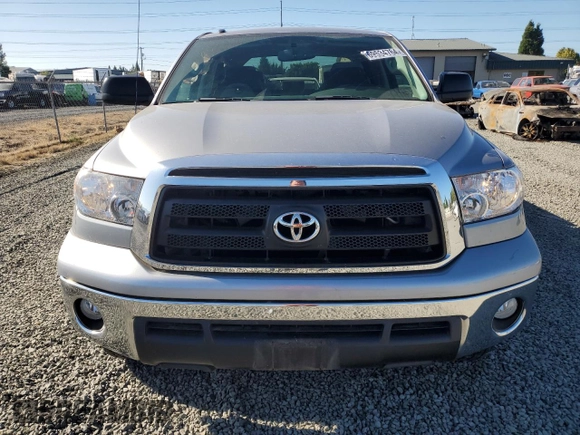 2012 Toyota Tundra 4WD Truck with VIN 5TFDM5F14CX035946, listed as a Copart auction lot 69534764 with 33,668 mi miles and Salvage Title. Bid and sale history available at carsss.com. Image 5.