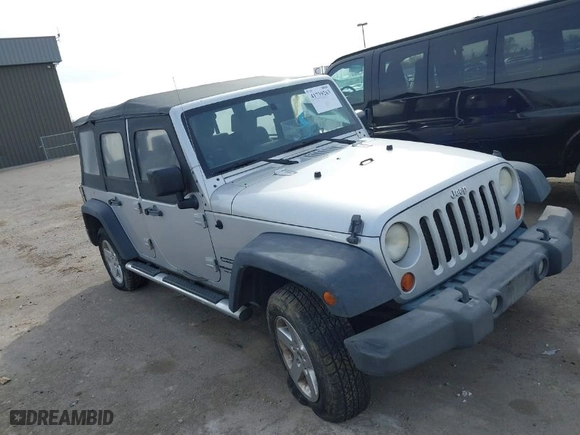 2010 Jeep Wrangler Unlimited Sport with VIN 1J4BA3H10AL112599, listed as a IAAI auction lot 41739263 with 156,301 mi miles. Bid and sale history available at carsss.com. Image 1.
