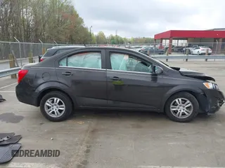 2013 Chevrolet Sonic LT with VIN 1G1JC5SH9D4193932, listed as a IAAI auction lot 41923606 with 132,339 mi miles and . Bid and sale history available at DreamBid. Image 14.