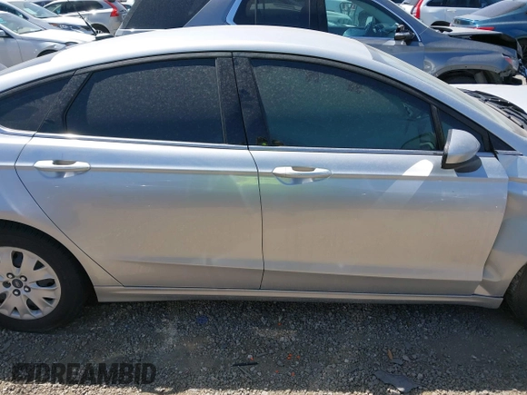 2019 Ford Fusion S with VIN 3FA6P0G71KR275393, listed as a IAAI auction lot 41827288 with 108,160 mi miles and . Bid and sale history available at DreamBid. Image 13.