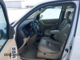 2003 Mazda Tribute ES with VIN 4F2CZ96133KM22960, listed as a IAAI auction lot 41550181 with 159,412 mi miles. Bid and sale history available at carsss.com. Image 5.