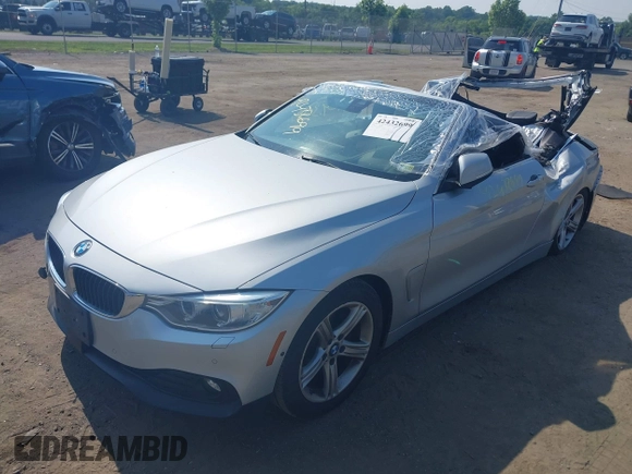 2014 BMW 4 Series 428i with VIN WBA3V7C55EJ873028, listed as a IAAI auction lot 42432699 with 24,063 mi miles and . Bid and sale history available at DreamBid. Image 18.