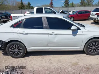 2021 Volkswagen Jetta S z VIN 3VWC57BU6MM045659, wystawiony jako IAAI lot #42201090 z przebiegiem 66 937 mil mil oraz . Historia ofert i sprzedaży dostępna na DreamBid. Obrazek 14.