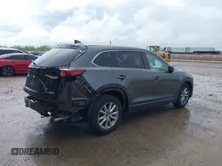 2016 Mazda CX-9 Sport with VIN JM3TCABY5G0122478, listed as a IAAI auction lot 42115795 with 134,980 mi miles and . Bid and sale history available at DreamBid. Image 4.