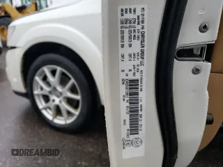 2014 Dodge Journey R/T z VIN 3C4PDDFG4ET199515, wystawiony jako Copart lot #86354504 z przebiegiem 128 888 mil mil oraz Szkoda całkowita • Salvage title. Historia ofert i sprzedaży dostępna na DreamBid. Obrazek 13.
