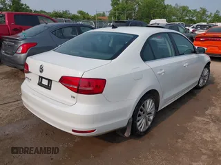 2015 Volkswagen Jetta SE with VIN 3VWD17AJ7FM302290, listed as a IAAI auction lot 42371920 with 127,631 mi miles and . Bid and sale history available at DreamBid. Image 4.