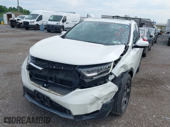2018 Honda CR-V Touring with VIN 2HKRW2H91JH665241, listed as a IAAI auction lot 42638694 with 62,066 mi miles and . Bid and sale history available at DreamBid. Image 6.
