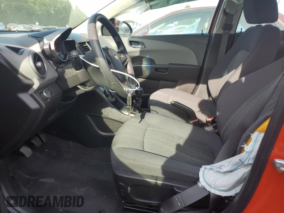 2012 Chevrolet Sonic LT z VIN 1G1JD5SB3C4231033, wystawiony jako Copart lot #56145205 z przebiegiem 43 015 mil mil oraz Szkoda całkowita • Salvage title. Historia ofert i sprzedaży dostępna na DreamBid. Obrazek 7.