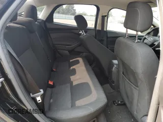 2018 Ford Focus SE z VIN 1FADP3F2XJL228407, wystawiony jako Copart lot #59254415 z przebiegiem 75 241 mil mil oraz Szkoda całkowita • Salvage title. Historia ofert i sprzedaży dostępna na DreamBid. Obrazek 10.