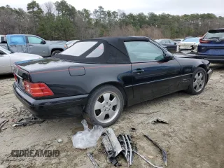 1999 Mercedes-Benz SL-Class with VIN WDBFA68F0XF184008, listed as a Copart auction lot 84998014 with 74,809 mi miles and Salvage Title. Bid and sale history available at carsss.com. Image 3.