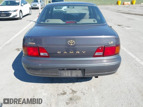 1996 Toyota Camry DX with VIN 4T1BG12K8TU915891, listed as a IAAI auction lot 41874731 with 57,564 mi miles. Bid and sale history available at carsss.com. Image 14.