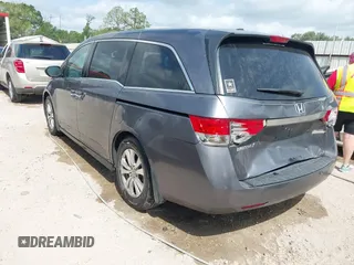 2014 Honda Odyssey EX-L with VIN 5FNRL5H69EB075115, listed as a IAAI auction lot 42046386 with 200,340 mi miles and . Bid and sale history available at carsss.com. Image 3.