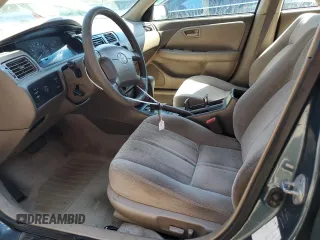 2001 Toyota Camry CE z VIN JT2BG22K410538709, wystawiony jako Copart lot #53295905 z przebiegiem 223 115 mil mil oraz Szkoda całkowita • Salvage title. Historia ofert i sprzedaży dostępna na DreamBid. Obrazek 7.