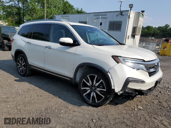 2019 Honda Pilot Elite with VIN 5FNYF6H09KB041935, listed as a Copart auction lot 60530515 with 57,526 mi miles and Salvage title. Bid and sale history available at DreamBid. Image 4.