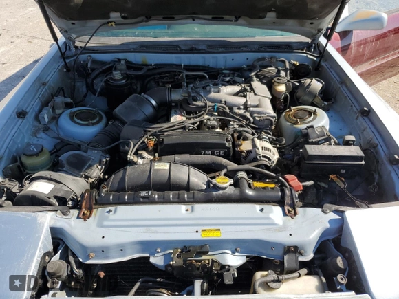 1989 Toyota Supra z VIN JT2MA70J8K0114002, wystawiony jako Copart lot #78068714 z przebiegiem 196 448 mil mil oraz Czysty tytuł • Clean title. Historia ofert i sprzedaży dostępna na DreamBid. Obrazek 11.