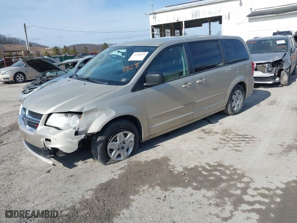 2012 Dodge Grand Caravan SE with VIN 2C4RDGBG3CR385529, listed as a IAAI auction lot 41506810 with 153,300 mi miles. Bid and sale history available at carsss.com. Image 2.