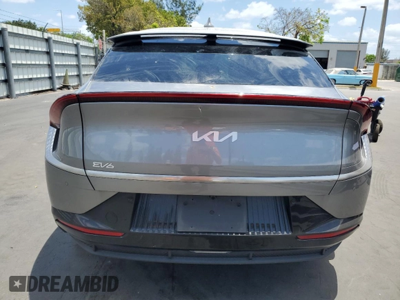 2023 Kia EV6 Wind with VIN KNDC34LA4P5602445, listed as a Copart auction lot 54865515 with 6,885 mi miles and Clean Title. Bid and sale history available at carsss.com. Image 6.