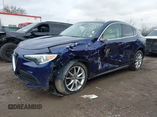 2019 Alfa Romeo Stelvio Ti z VIN ZASPAKBN4K7C43201, wystawiony jako IAAI lot #41121052 z przebiegiem 32 768 mil mil oraz . Historia ofert i sprzedaży dostępna na DreamBid. Obrazek 2.