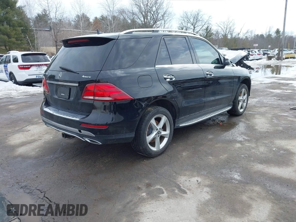 2018 Mercedes-Benz GLE 350 with VIN 4JGDA5HB2JB174655, listed as a IAAI auction lot 41651012 with 108,455 mi miles and . Bid and sale history available at DreamBid. Image 4.