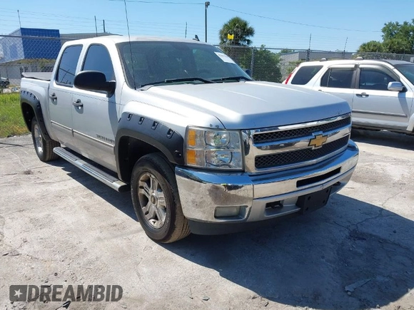 2013 Chevrolet Silverado 1500 LT with VIN 3GCPKSE71DG203443, listed as a IAAI auction lot 42033447 with 128,904 mi miles. Bid and sale history available at carsss.com. Image 1.