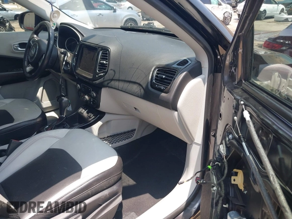 2018 Jeep Compass Limited with VIN 3C4NJCCB5JT253420, listed as a IAAI auction lot 42443809 with 98,057 mi miles and . Bid and sale history available at DreamBid. Image 5.