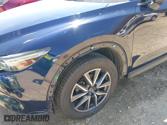 2018 Mazda CX-5 Grand Touring with VIN JM3KFADM1J0322049, listed as a IAAI auction lot 41891079 with 174,939 mi miles and . Bid and sale history available at DreamBid. Image 17.