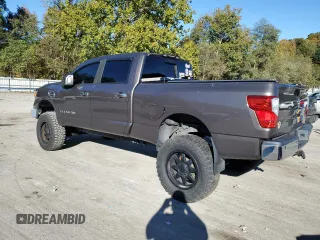 2016 Nissan Titan XD PRO-4X with VIN 1N6BA1F4XGN502630, listed as a Copart auction lot 75690604 with 183,158 mi miles and Clean Title. Bid and sale history available at carsss.com. Image 2.