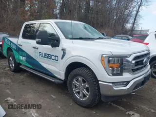 2021 Ford F-150 XL with VIN 1FTEW1EPXMFC83574, listed as a IAAI auction lot 41694174 with 57,814 mi miles. Bid and sale history available at carsss.com. Image 1.