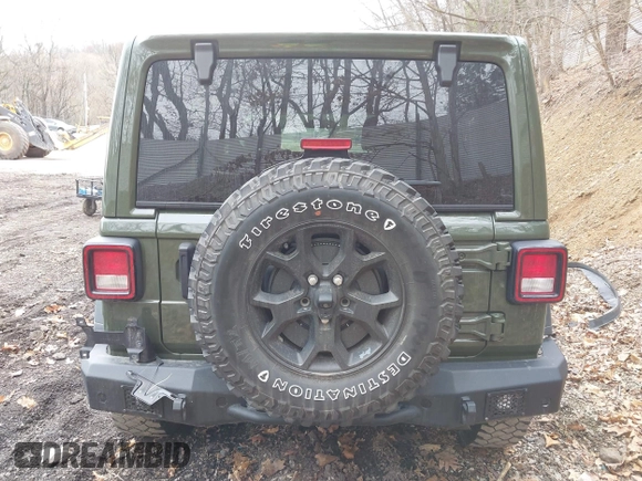 2021 Jeep Wrangler Unlimited Willys with VIN 1C4HJXDNXMW579595, listed as a IAAI auction lot 41930989 with 32,148 mi miles and . Bid and sale history available at DreamBid. Image 17.