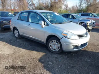 2011 Nissan Versa 1.8 S with VIN 3N1BC1AP5BL432979, listed as a IAAI auction lot 41932890 with 150,041 mi miles. Bid and sale history available at carsss.com. Image 1.