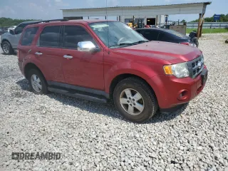 2009 Ford Escape XLS with VIN 1FMCU02739KA51016, listed as a Copart auction lot 63267285 with 152,559 mi miles and Salvage title. Bid and sale history available at DreamBid. Image 4.