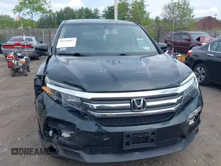 2016 Honda Pilot EX-L with VIN 5FNYF6H53GB070382, listed as a IAAI auction lot 39476567 with 83,741 mi miles and . Bid and sale history available at DreamBid. Image 12.