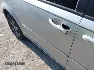 2009 Dodge Grand Caravan SXT z VIN 2D8HN54189R671683, wystawiony jako IAAI lot #42350455 z przebiegiem 220 306 mil mil oraz . Historia ofert i sprzedaży dostępna na DreamBid. Obrazek 6.