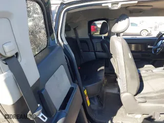 2008 Toyota FJ Cruiser with VIN JTEBU11FX8K007698, listed as a IAAI auction lot 41323633 with 219,075 mi miles. Bid and sale history available at carsss.com. Image 8.