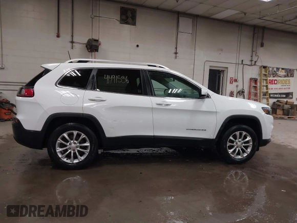 2019 Jeep Cherokee Latitude with VIN 1C4PJMCB7KD142941, listed as a IAAI auction lot 41491536 with 117,840 mi miles. Bid and sale history available at carsss.com. Image 13.