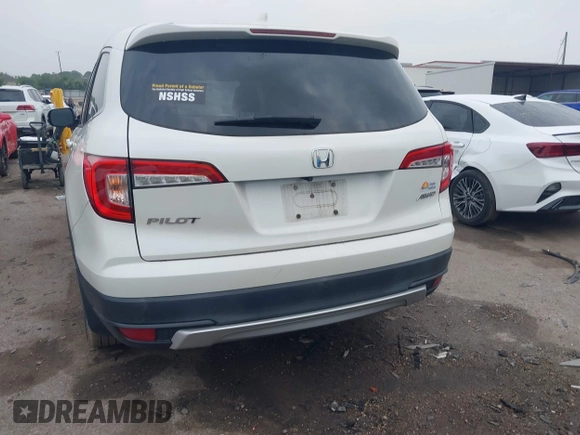 2019 Honda Pilot EX-L with VIN 5FNYF6H52KB025930, listed as a IAAI auction lot 42117673 with 84,721 mi miles and . Bid and sale history available at DreamBid. Image 16.